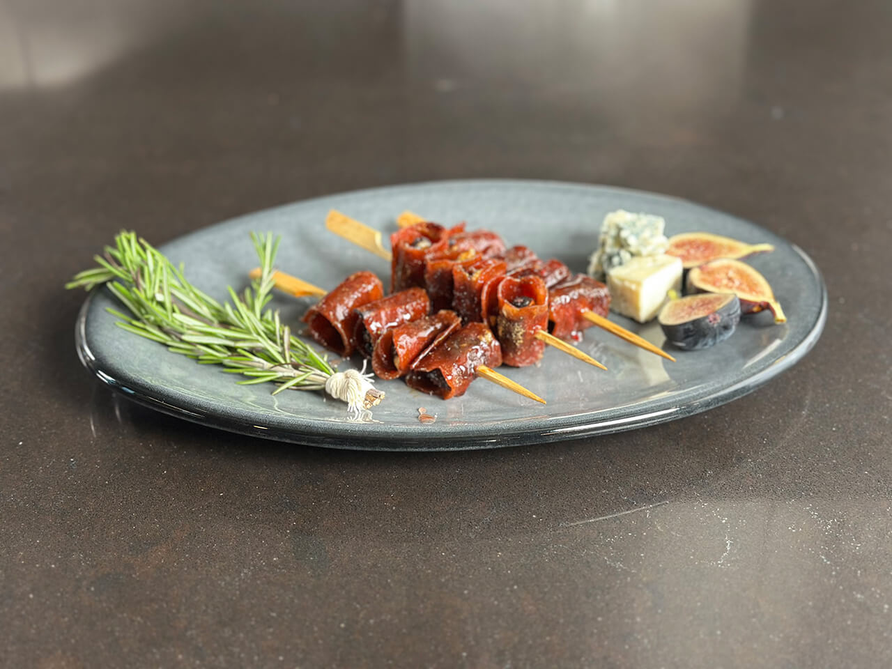 Gorgonzola Stuffed Figs Wrapped in Candied Turkey Bacon image